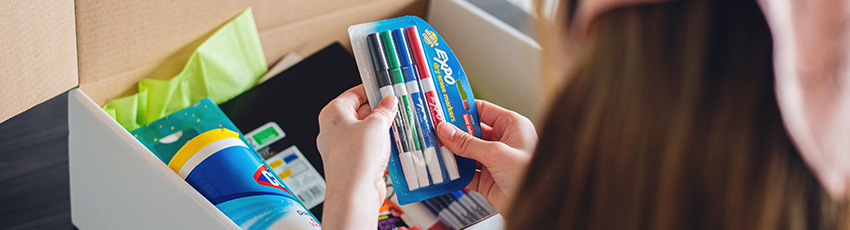 Child-Holds-Expo-Markers